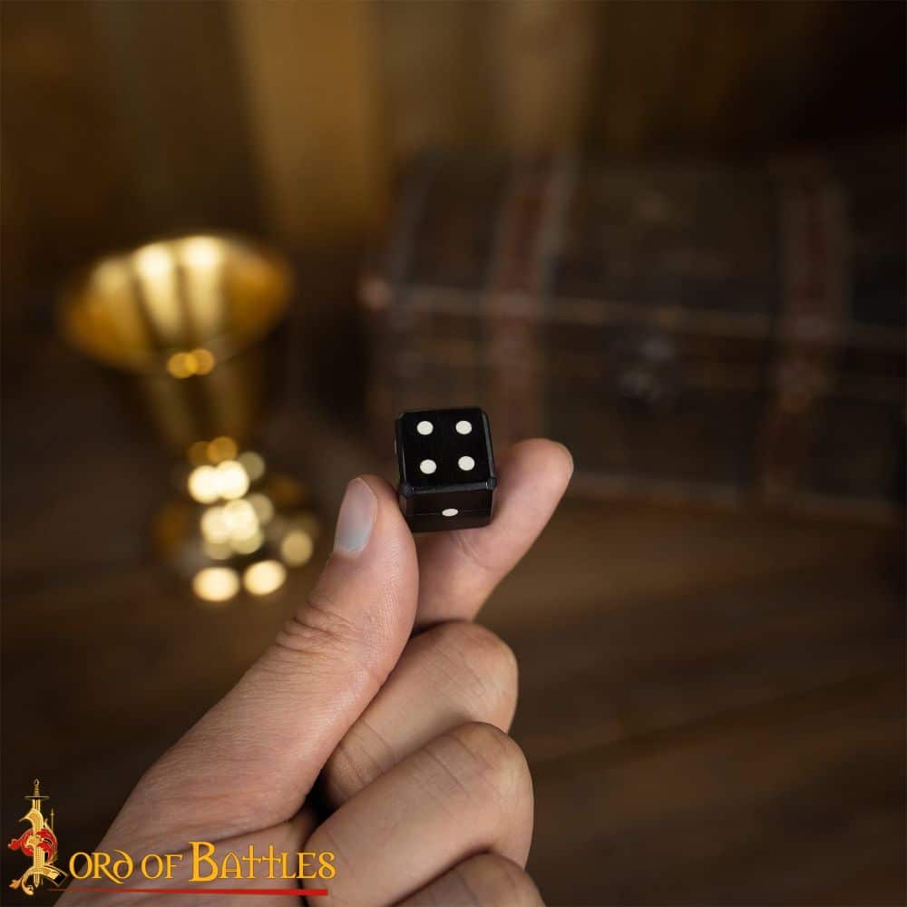 Pair of carved Horn Dice with inlaid pips