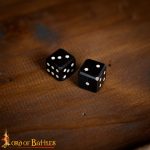 Pair of carved Horn Dice with inlaid pips